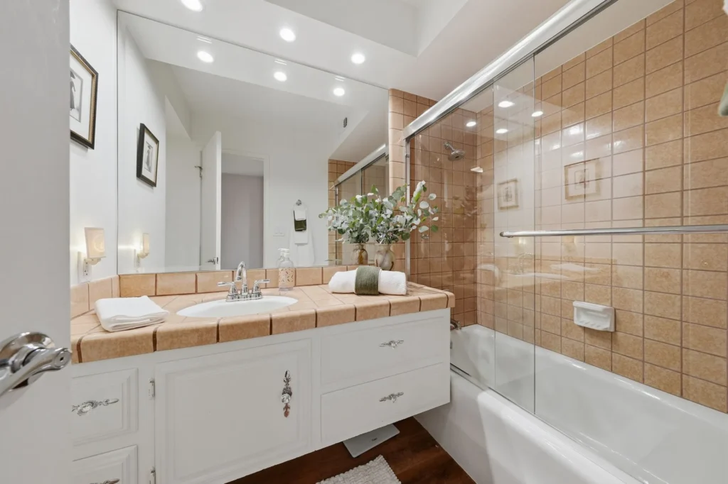 Guest bathroom with updated fixtures and finishes.