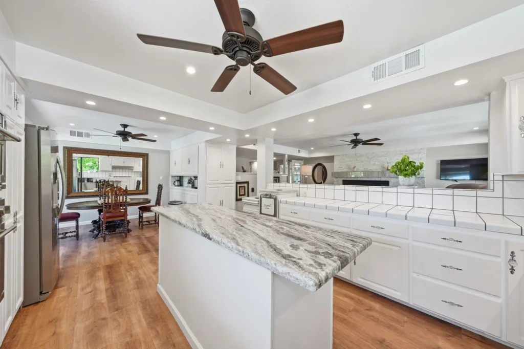 Open-concept kitchen with generous counters serving the independent living level.